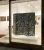 En vitrine, paravent en laque de Chine de Gaston Suisse.